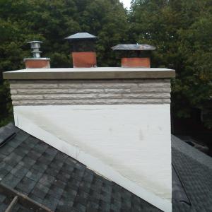 Chimney Limestone and new cement coating.