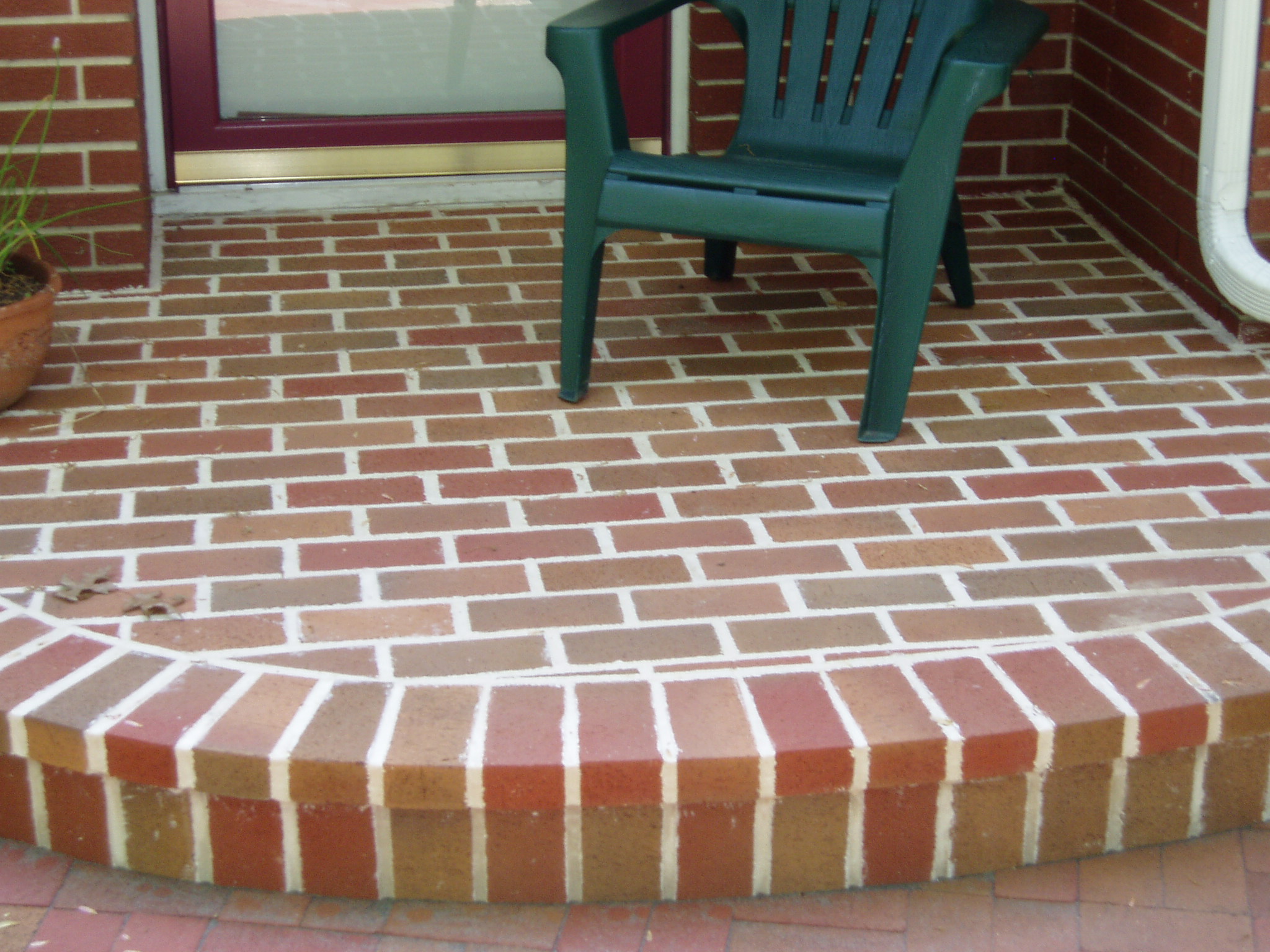 Brick Stoop Over Concrete Stoop. A nice area to relax and rest.